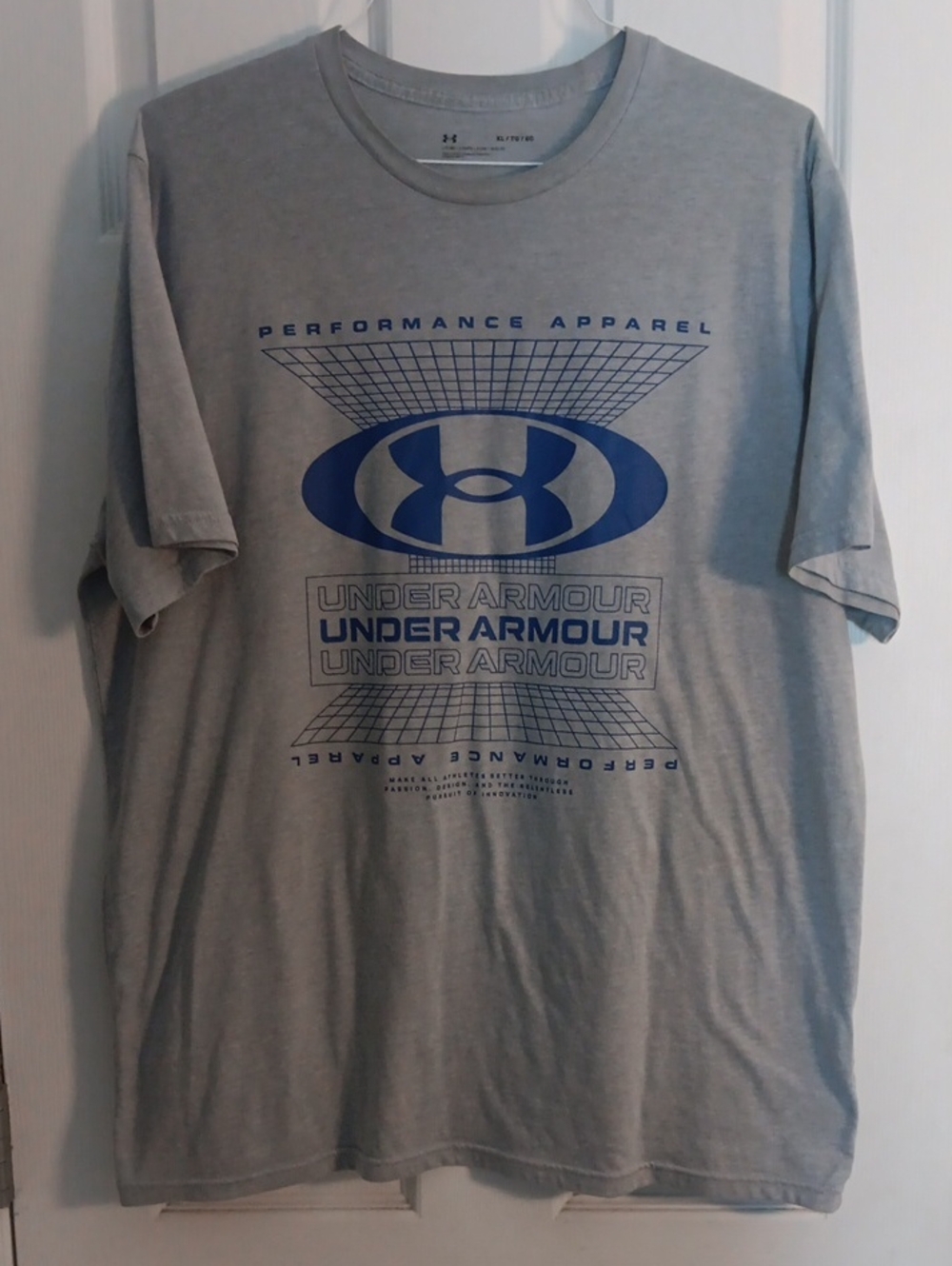 Under Armour Men’s Light Gray Short Sleeve Tee with Blue Graphic